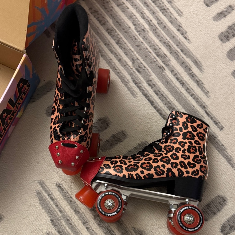 Impala Leopard Print Roller Skates with toe guards and wrist guards